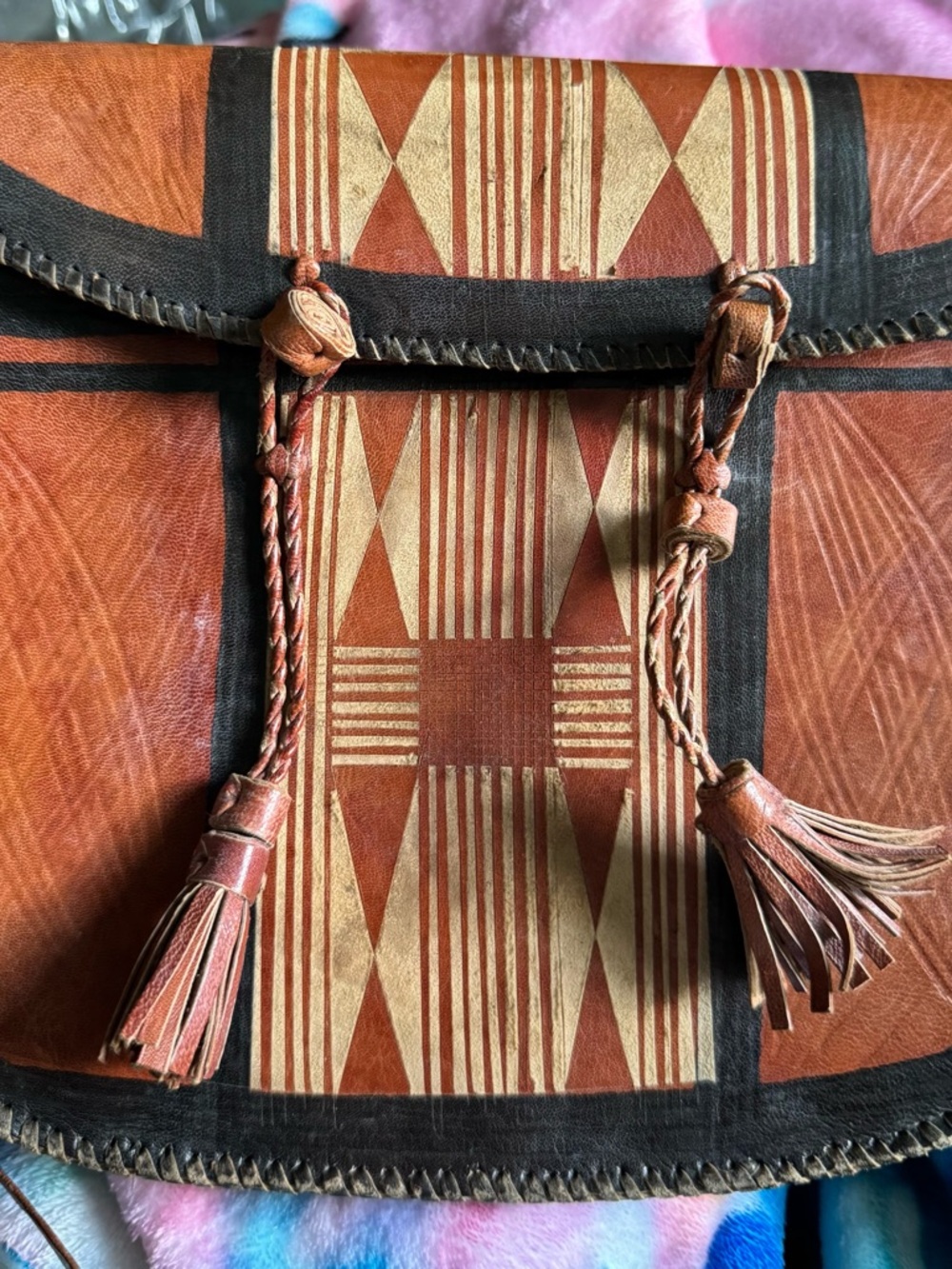 Ghanaian Brown Geometric Leather Crossbody Bag with Tassel Accent